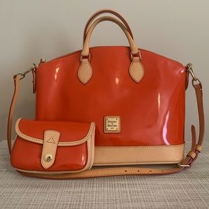 Orange Dooney & Burke purse with matching wristlet